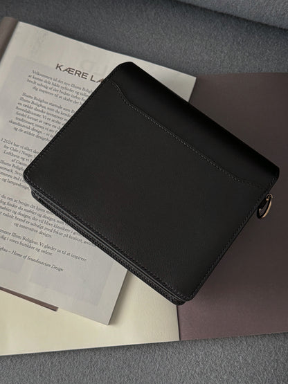 Hermès Mini Roulis 黑色淡金釦